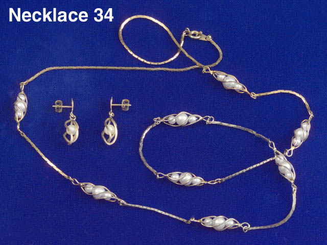 Pearls in Cage Necklace and Earrings